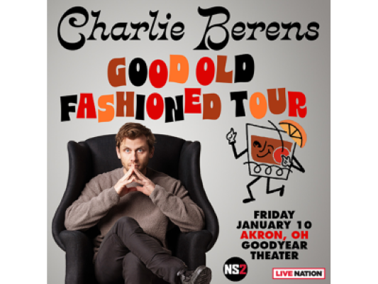 Man sitting in a chair with text above his head that reads "Charlie Berens, Good Old Fashioned Tour."