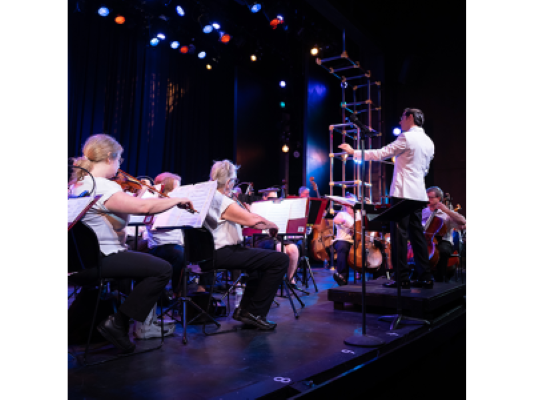 Photo of an orchestra on stage.