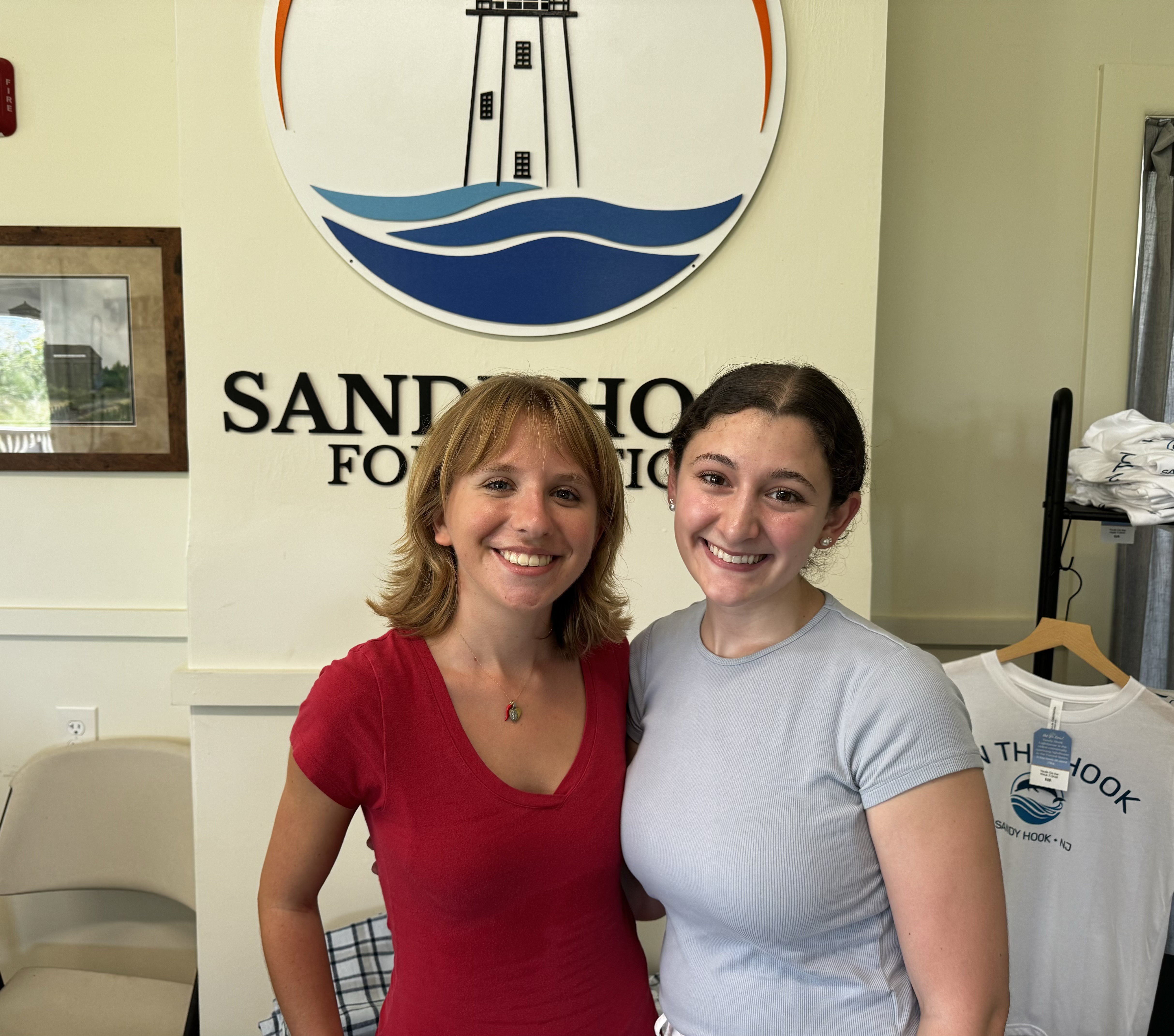 picture of sandy hook foundation summer interns, juliana and sam, in the store at the lifesaving station