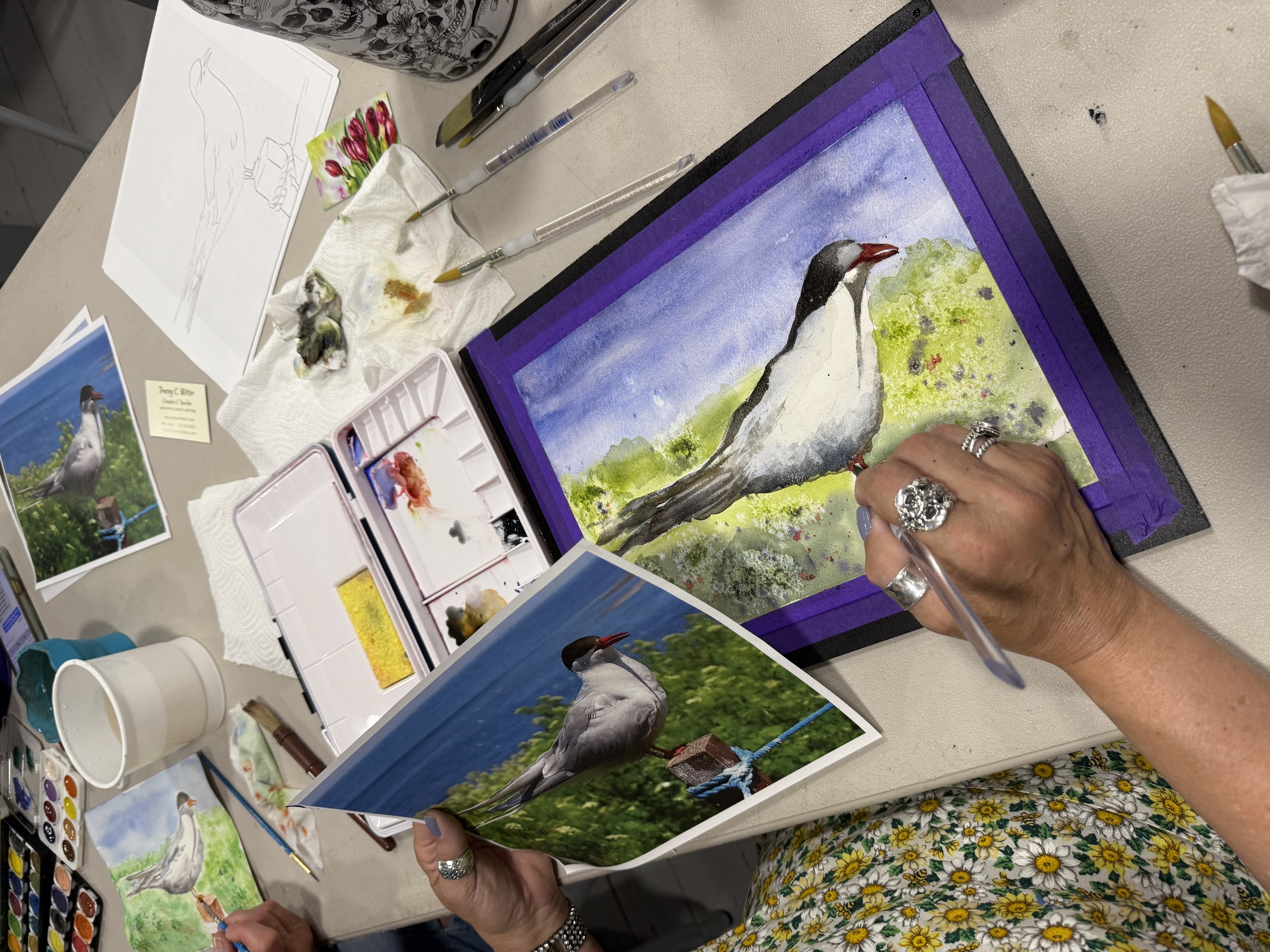 watercolor of a bird being painted by program participant